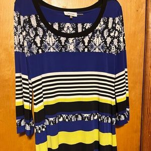 Blue, yellow, black and white patterned Calvin Klein dress. Knee length
